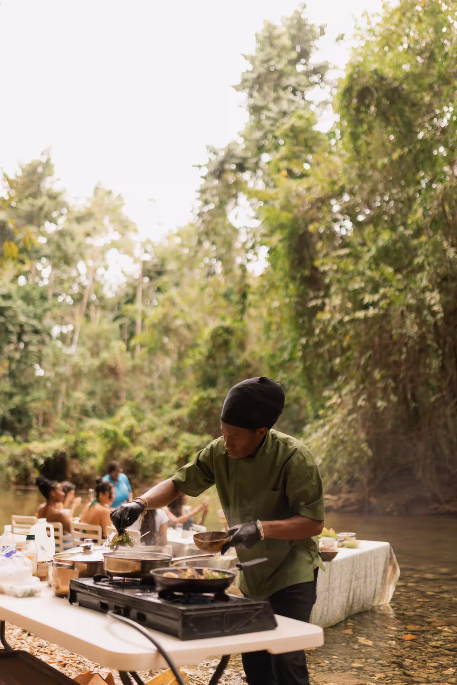Chef Vita cooking over open fire